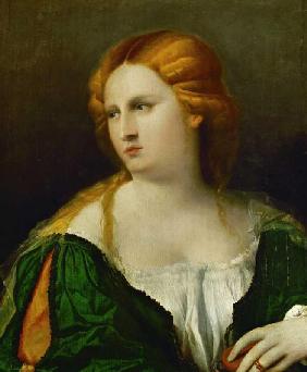 Young lady in a green dress holding a box