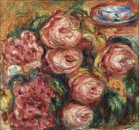Composition with roses and a cup of tea