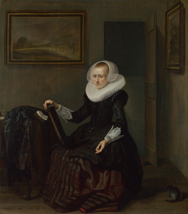A Woman holding a Mirror from Pieter Codde