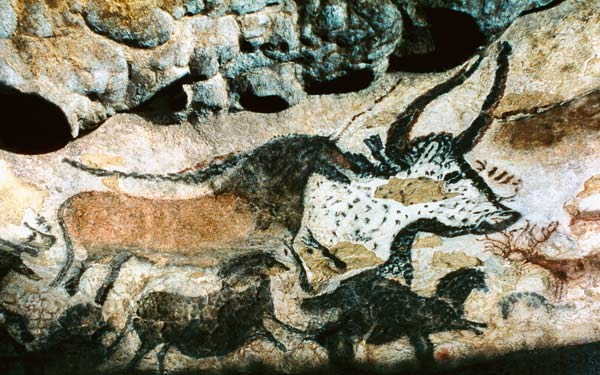 Rock painting of a bull and horses from Prehistoric
