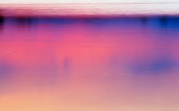 Farbenspiel im Wasser durch einen Sonnenuntergang am Rauchwarter See from Robert Kalb