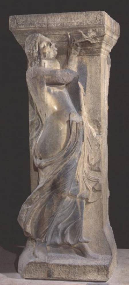 Decorated stone pillar with a bacchante playing a double flute from Roman