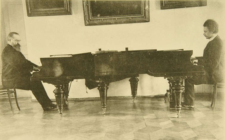 Composers Sergei Taneyev and Alexander Goldenweiser play the piano from Sophia Andreevna Tolstaya