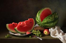 Still life with watermelon and grapes