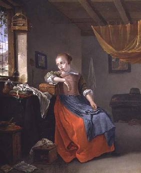 A Seated Woman in an Interior Gazing out of the Window