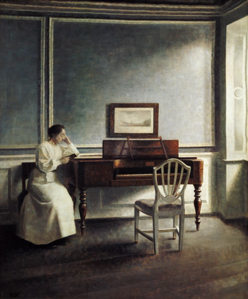 Woman, reading next to a piano in a book. from Vilhelm Hammershoi
