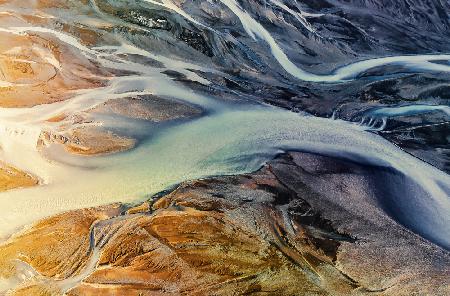 Natures Artistry: Glacier Rivers at Dusk